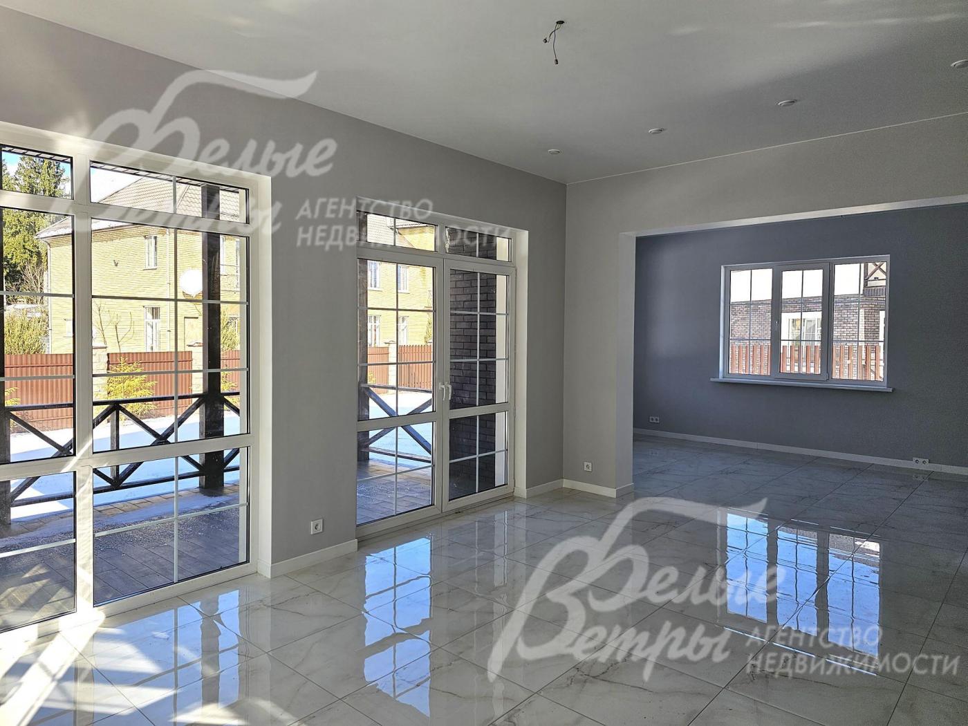 Гостиная с зоной кухни-столовой