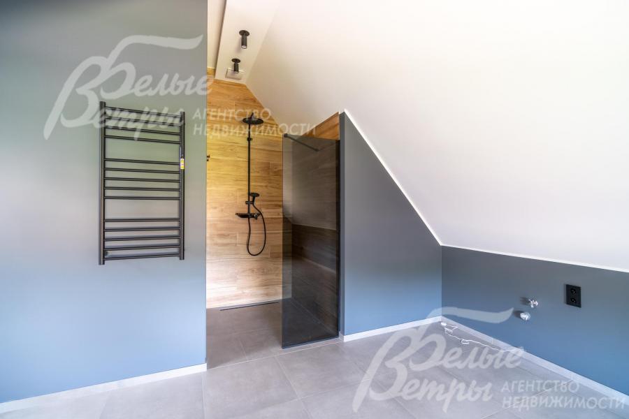 Постирочная на мансардном этаже с душевой