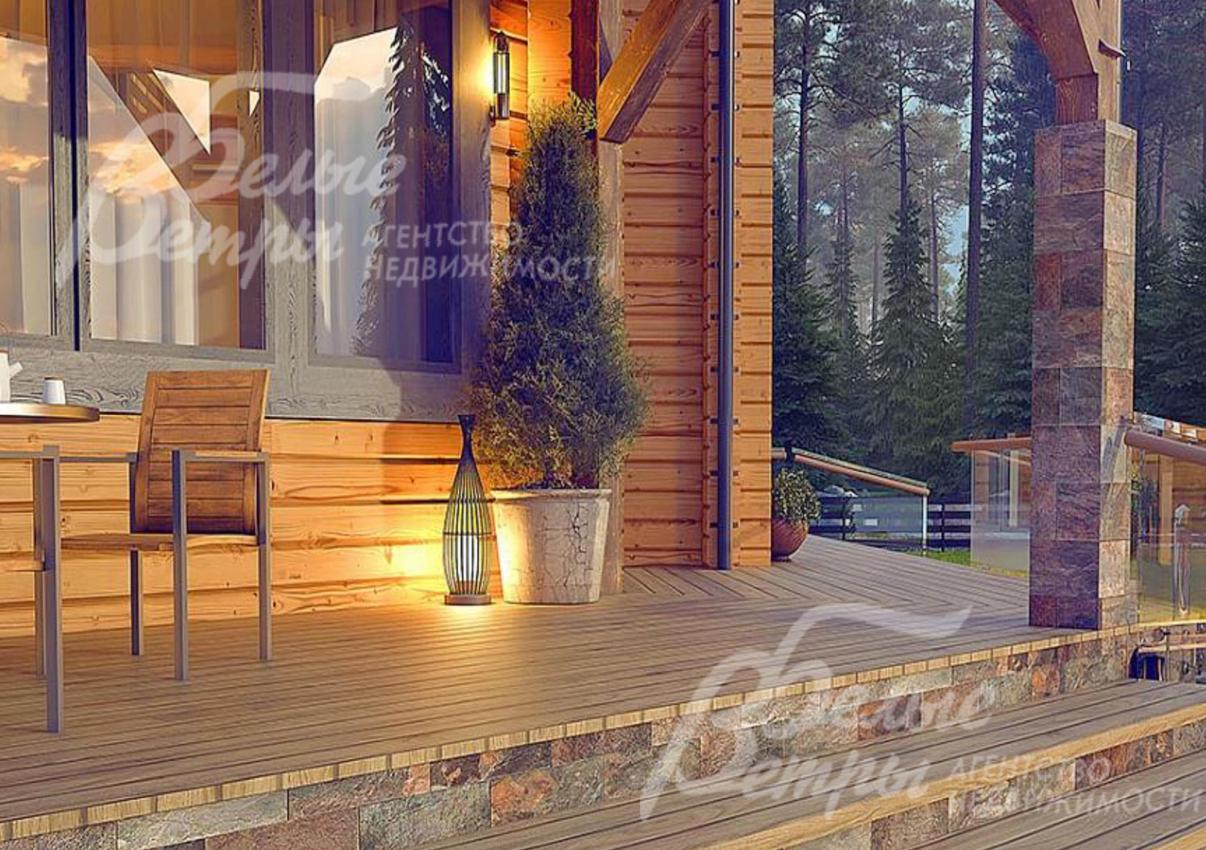 В доме гостиная со вторым светом и камином и выходом на террасу