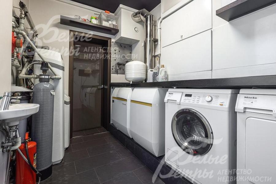 Оборудованная постирочная 
