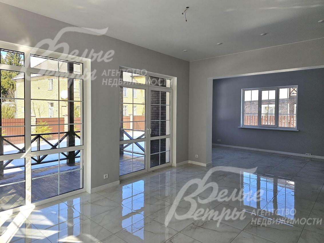 Гостиная с зоной кухни-столовой